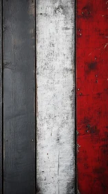 Weathered tricolor wooden planks in gray, white, and red.