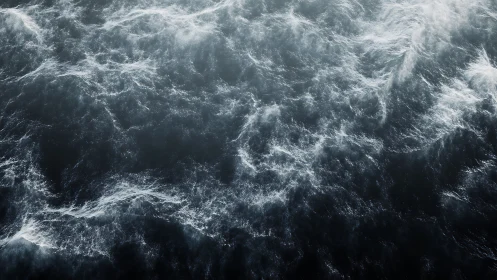 Storm-tossed midnight sea swirling in ghostlit foam.