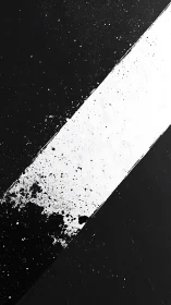 Diagonal monochrome stripe with dispersed paint splatters.