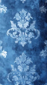 Blue damask floral pattern repeats on textured background
