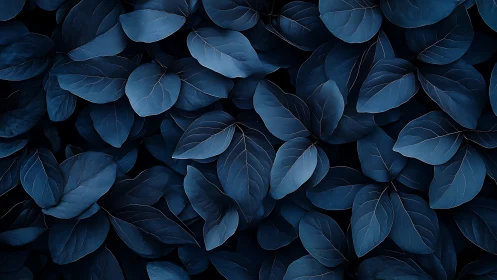 Midnight blue leaves layered in a softly glowing forest.