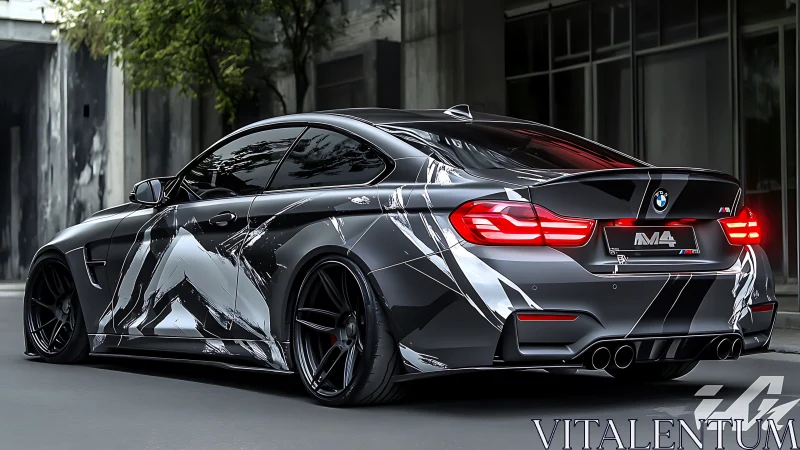 BMW M4 coupe with monochrome geometric wrap in urban light.