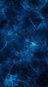 Deep blue marble texture shows glowing fractures and veins