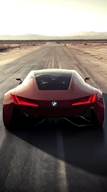 Crimson desert supercar poised on an endless horizon road.