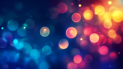 Vibrant abstract bokeh lights in blue, pink, and yellow hues.