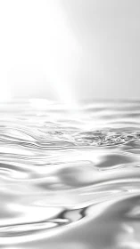 Minimalist liquid surface with luminous high-key structure.