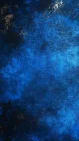 Midnight pigments quietly collapse into a storm of electric blue