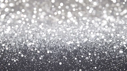 Silver bokeh snowfall drifts across a dreamy twilight haze.