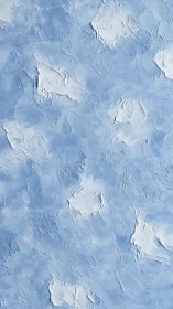 Icy textured blue plaster wall evokes winter calmness.