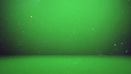 Green gradient backdrop with scattered white particle noise.