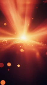 Radial orange light burst with bokeh particles over dark field.