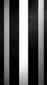 Vertical grayscale stripe array with textured tonal contrast.