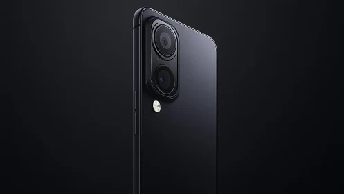 Midnight smartphone camera tower gleams in minimalist dark.