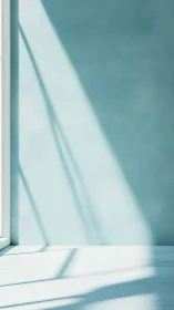 Sunlit interior wall with elongated window shadows in view.