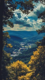 Mountain valley town framed by dense foliage in vivid hues