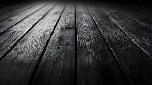 Low-key wooden floor perspective with cinematic vignette.