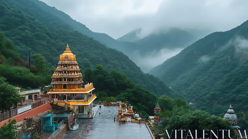 Hill temple complex in lush green misty mountain valley.