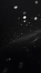 Low light micro-particle scatter with bokeh dispersion field.