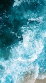 Photorealistic aerial study of breaking turquoise surf patterns.