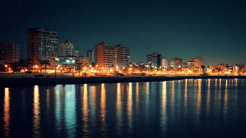 Nocturnal coastal skyline with specular neon water reflections.