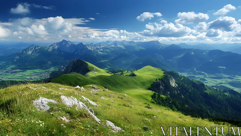Mountain ridgeline with green meadows under clouded sky.