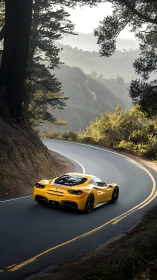 Yellow mid‑engine supercar on serpentine forest mountain road.
