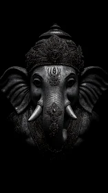 Silent stone Ganesha emerges from midnight shadowed void