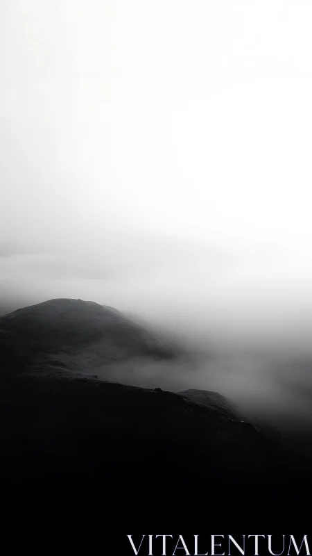 High contrast foggy ridgeline in minimal monochrome landscape