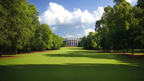 Sunlit green lawn leading to a grand white-columned mansion.