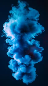 Blue ink cloud suspended in dark liquid space.