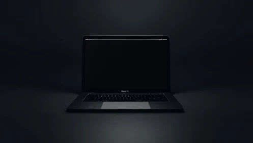 Closed-screen laptop is centered within a dark frame