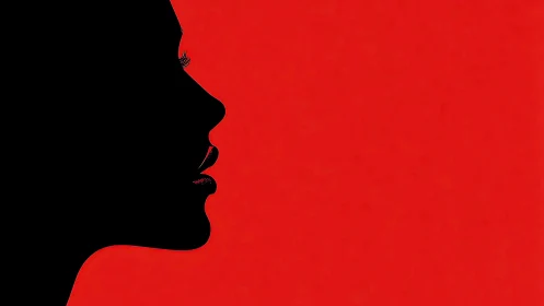 Silhouette profile of woman against solid red background.