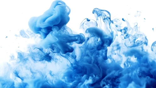 Blue pigment diffusion in liquid on white isolated background.