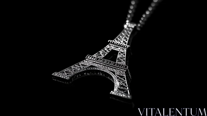 Macro close up isolates jeweled Eiffel Tower pendant in noir light