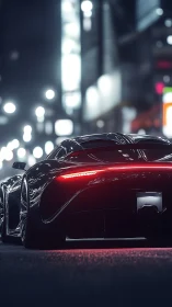 Midnight rear view of futuristic hypercar on wet neon street