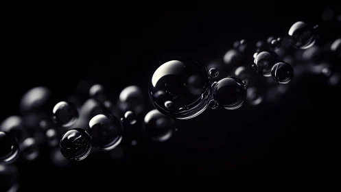 Shiny black bubbles floating in a dark abstract digital background.