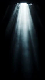 Photographic volumetric light shaft in deep negative space.