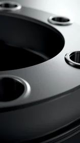 Close view shows circular metallic flange with bolted apertures