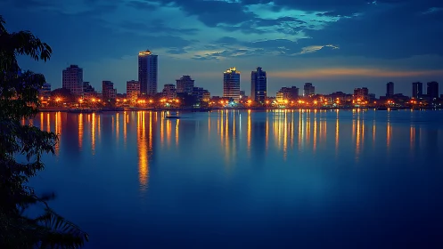 Midnight skyline serenade over glassy electric water.