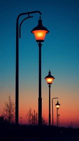 Streetlamps glow warmly against a tranquil dusk sky