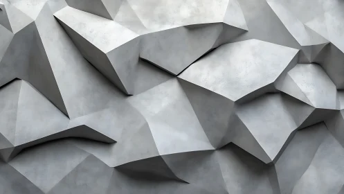 Faceted concrete wall surface shows angular geometric relief