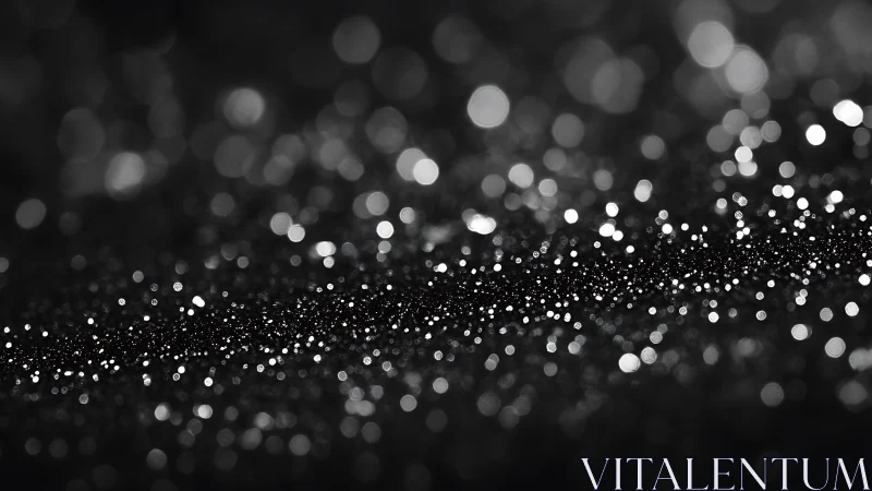 Glittering bokeh lights drift across a dark abstract surface