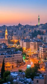 Twilight cityscape with minarets and curving arterial roads.