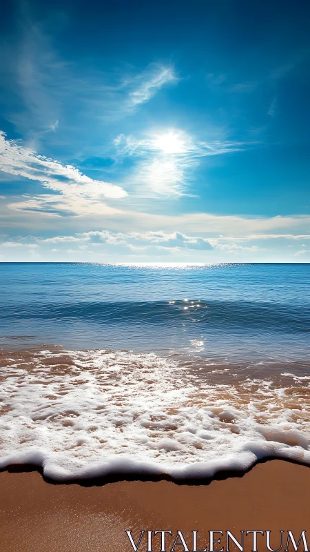 Sunlit shoreline shows gentle waves rolling onto sandy beach
