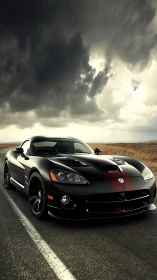 Black sports car with red stripe parked on rural highway