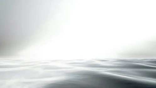 Minimal seascape with soft waves under bright horizon.