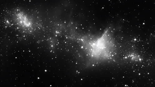 Stellar nebula glows softly within a vast star field