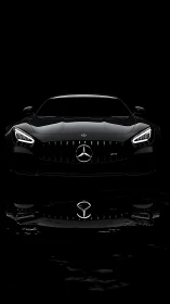 Front-illuminated black sports coupé isolates in high-contrast void