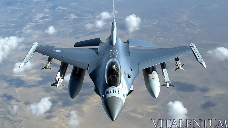 Steel falcon knifes through desert sky above wandering clouds.