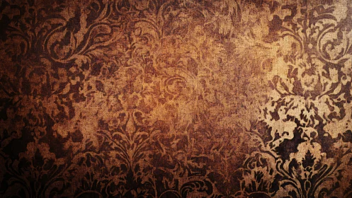 Textured brown damask surface with worn ornamental pattern.